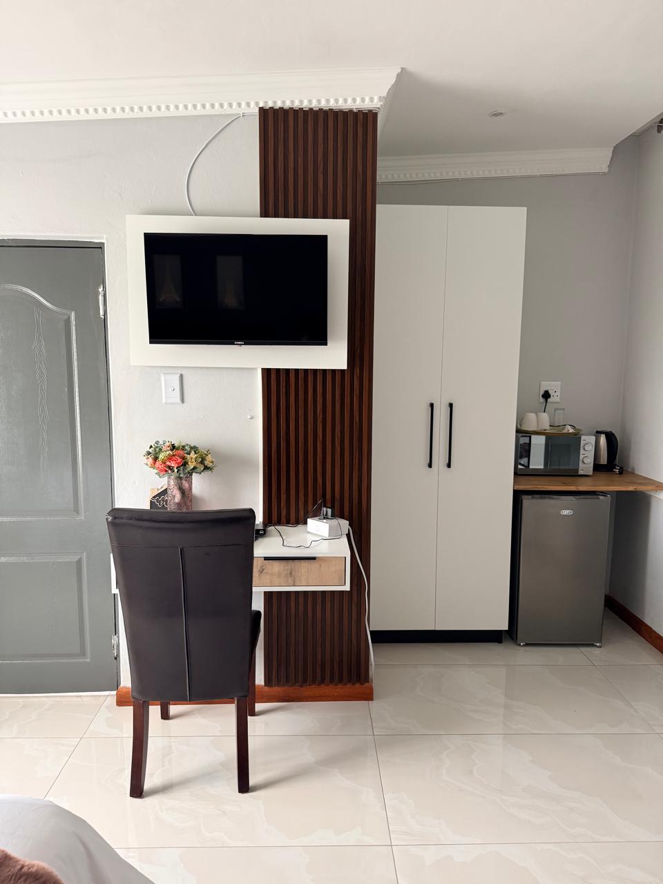 Presidential Suite seating and in-room amenities